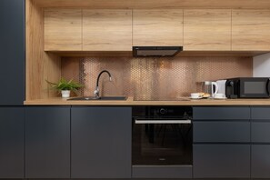 公寓, 2 間臥室, 陽台 | 私人廚房 | 微波爐、烤箱、洗碗機、咖啡機/沖茶器