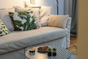 Apartamento superior | Área de estar | Smart TV 55 polegadas com canais a cabo