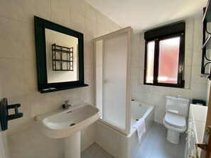 Hair dryer, towels, soap, shampoo