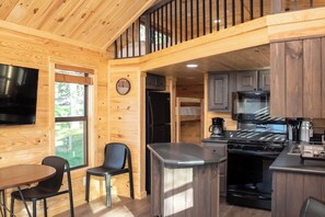 Magnolia Cabin | Private kitchen | Full-size fridge, microwave, oven, stovetop - Camp Fimfo Waco (Waco)