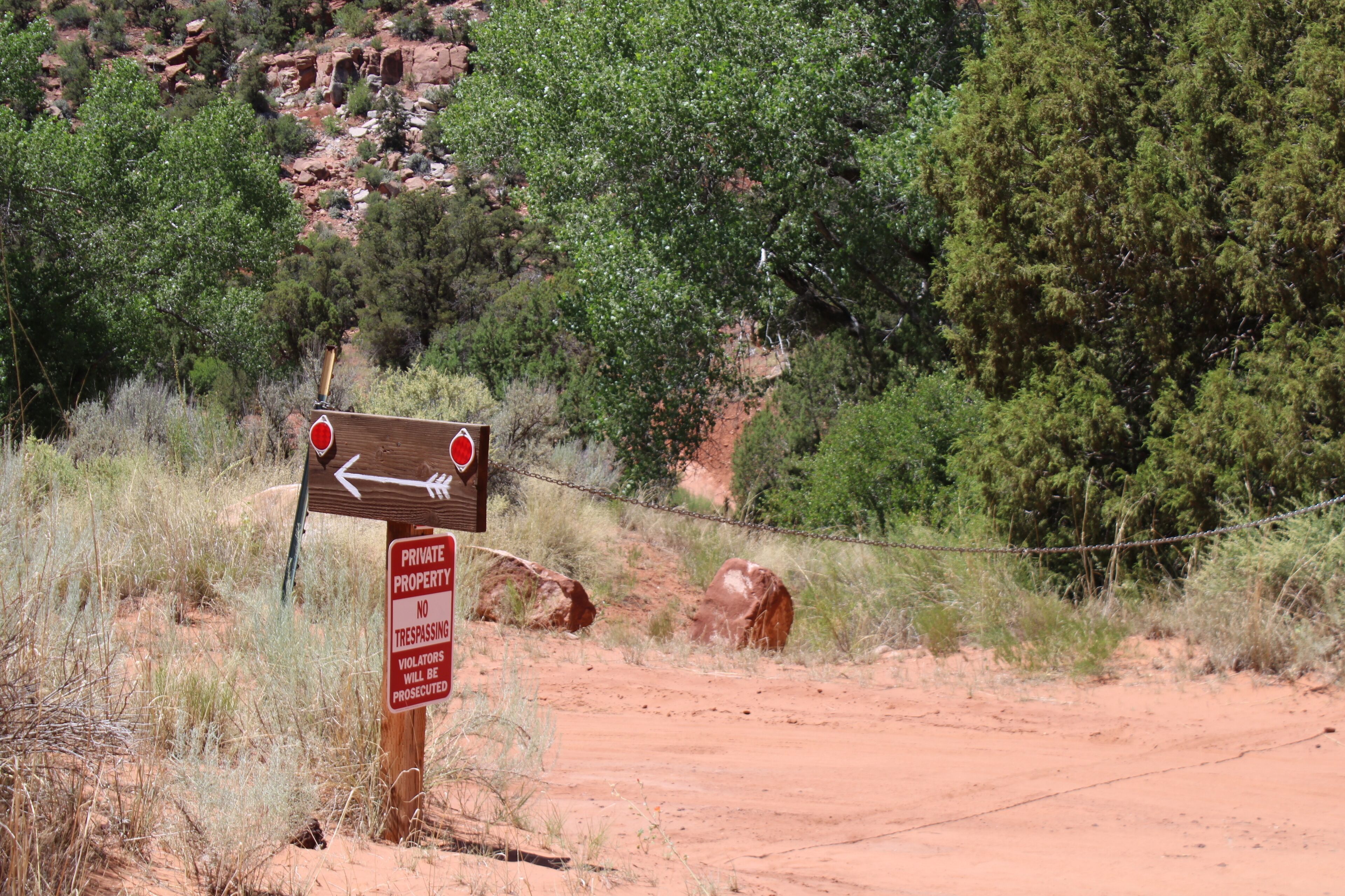 A sign indicating private property with no trespassing allowed.