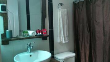 Shower, towels, soap, shampoo