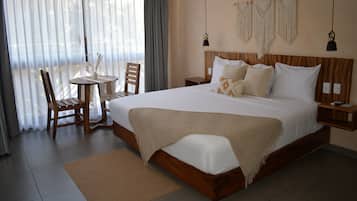 Habitación Deluxe | Ropa de cama de alta calidad, camas Select Comfort y ropa de cama