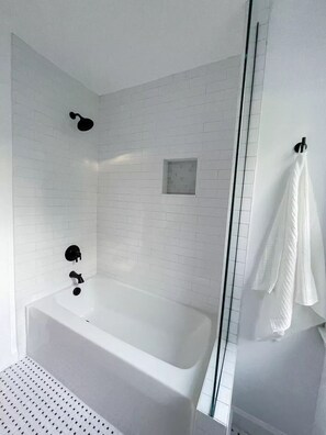 Shower, hair dryer, towels, soap