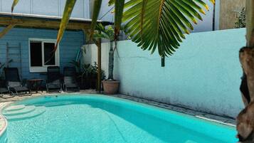 Outdoor pool, pool umbrellas, pool loungers