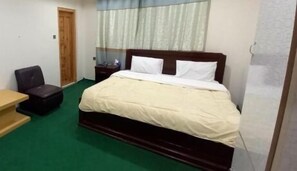 Chambre Double Deluxe | 1 chambre, chambres insonorisées, fer et planche à repasser