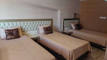 Family Triple Room, Multiple Beds | Premium bedding, desk, iron/ironing board, free WiFi