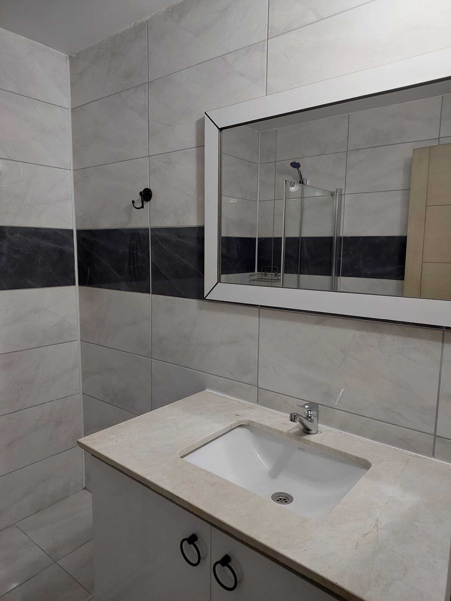 Family Quadruple Room | Bathroom | Shower, hair dryer, slippers, towels