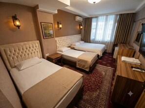 Family Quadruple Room | Premium bedding, desk, iron/ironing board (on request), WiFi (free) - Şenkol Hotel (Ipsala)