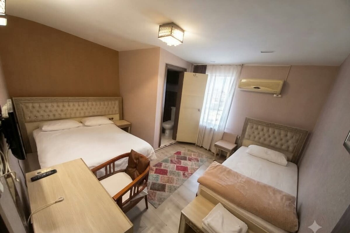 Family Triple Room | Premium bedding, desk, iron/ironing board (on request), WiFi (free)
