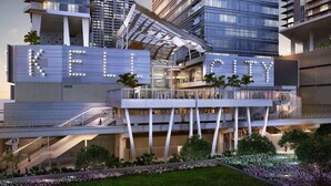 A modern multi-story building with a prominent 'KELL CITY' sign, featuring a glass facade, multiple balconies, and a central atrium with staircases. - PRESTIGE PENTHOUSE W OCEAN VIEW BRICKELL (Miami)