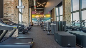A gym with treadmills, ellipticals, and weight machines. - PRESTIGE PENTHOUSE W OCEAN VIEW BRICKELL (Miami)