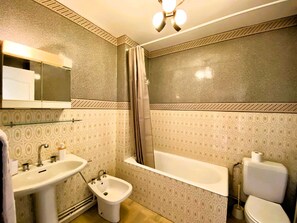 Bathtub, hair dryer