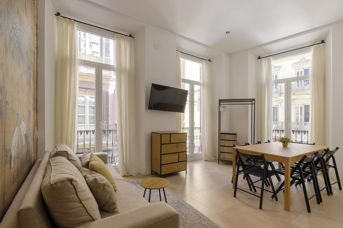 Family Apartment | Living area | 40-inch Smart TV with satellite channels