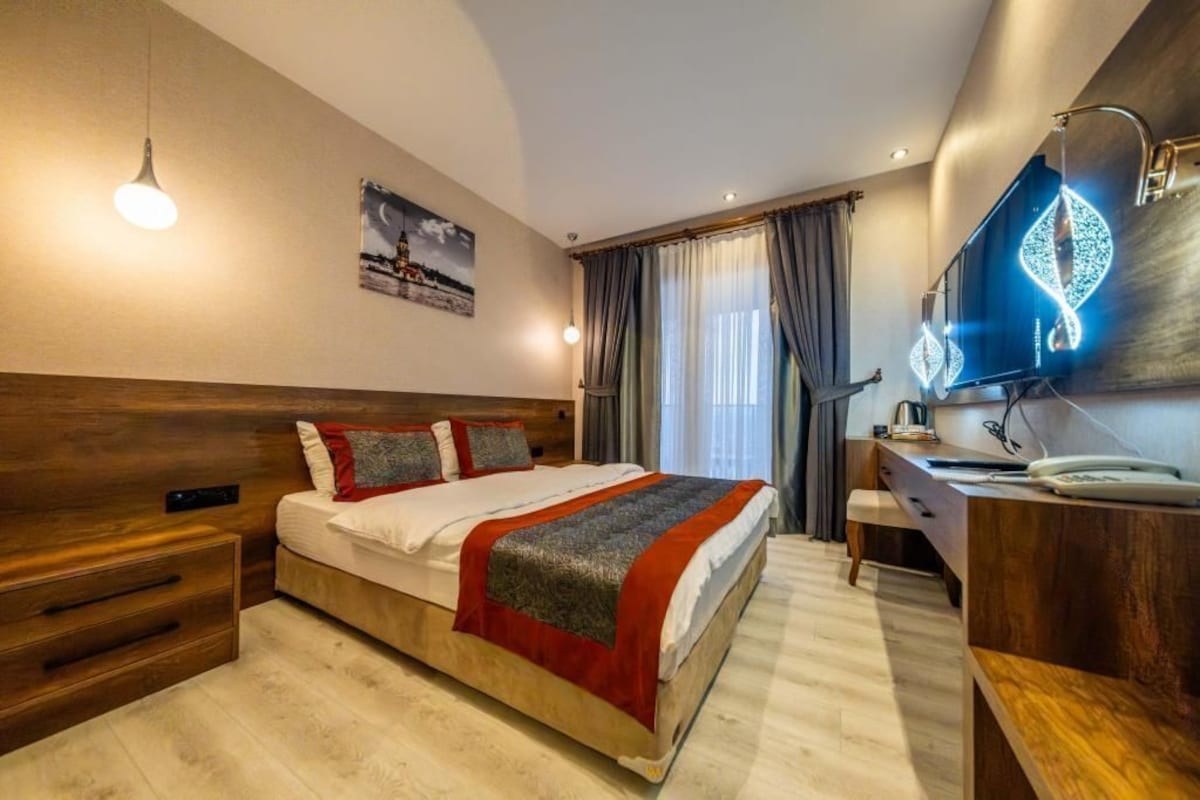 Ropa de cama de alta calidad y tabla de planchar con plancha