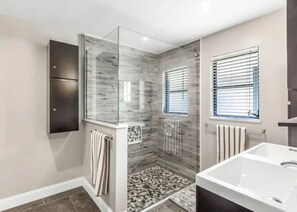 Shower, hair dryer, towels, soap