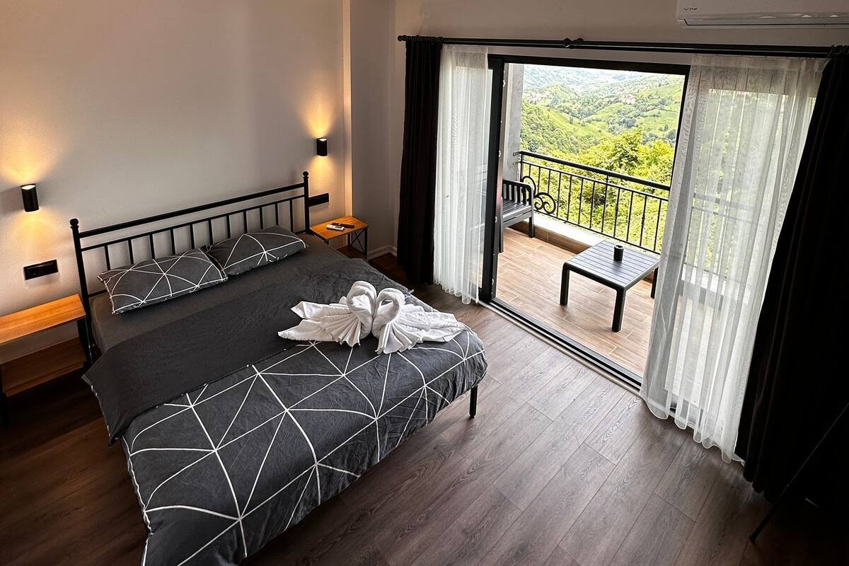 Deluxe-Zimmer | Hochwertige Bettwaren, Daunenbettdecken, individuell dekoriert