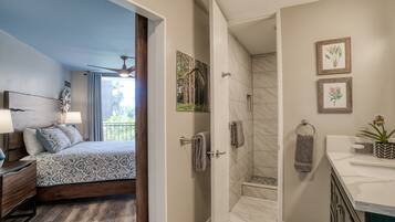 Luxury Condo, 1 Bedroom (KM 205) | Bathroom | Shower, rainfall showerhead, hair dryer, towels