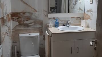 Hair dryer, towels, soap, toilet paper