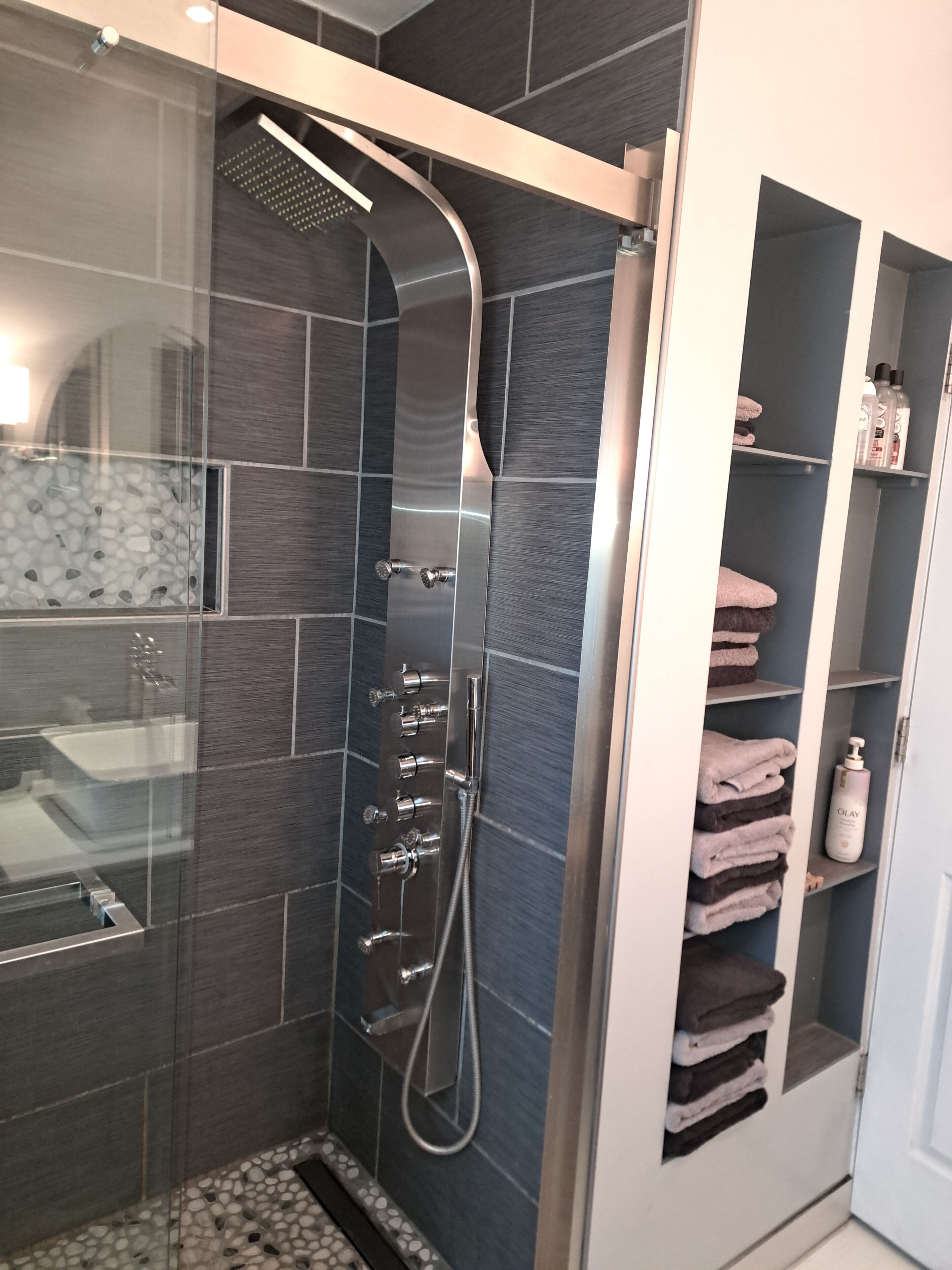 Shower, towels, toilet paper