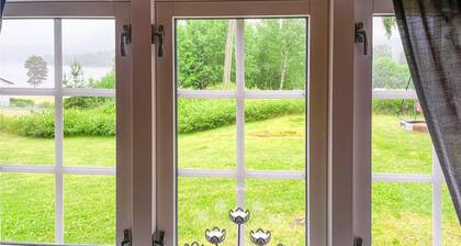 Nice home in Sagstua with lake view