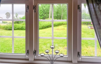 Nice home in Sagstua with lake view