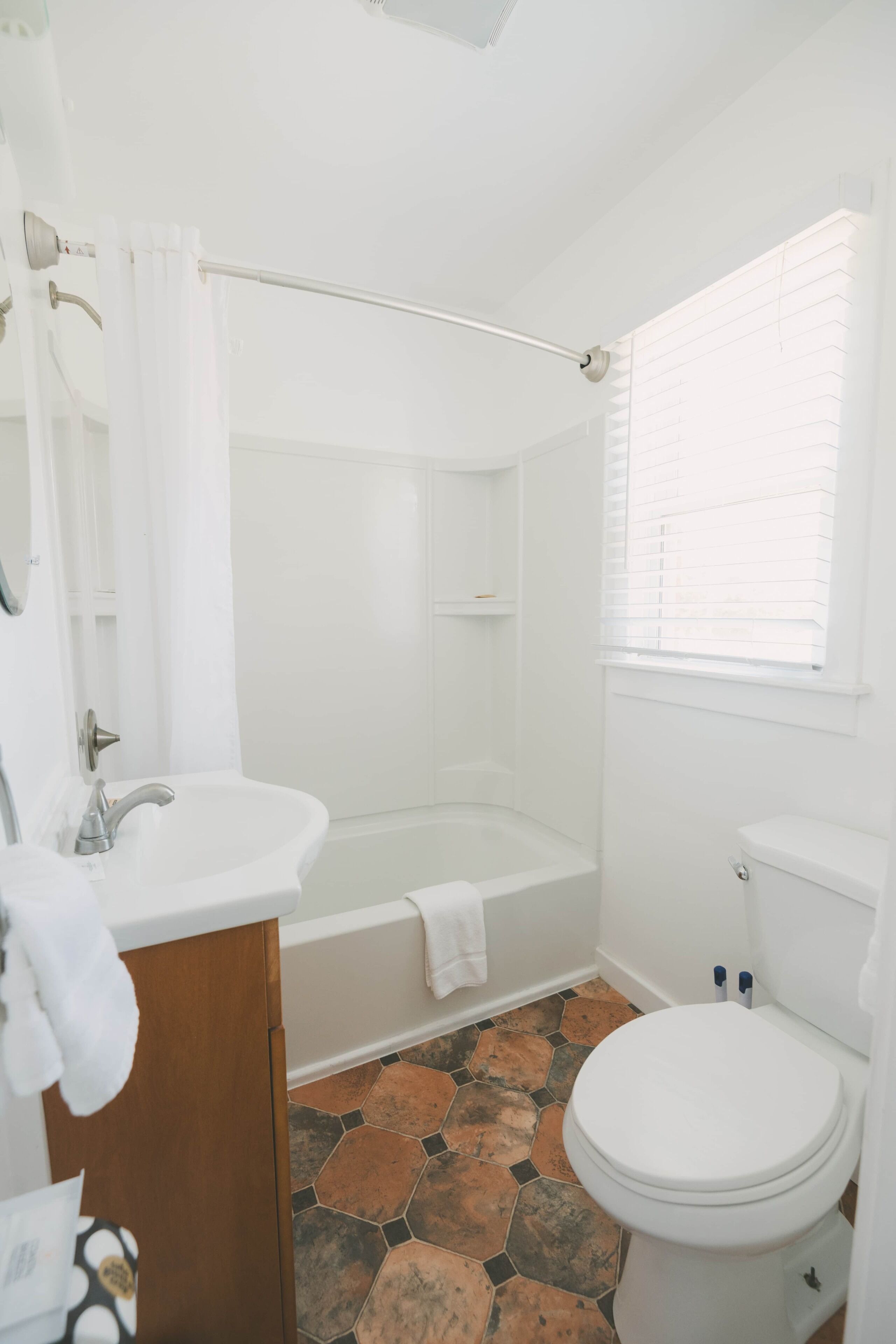 Bathtub, hair dryer, towels