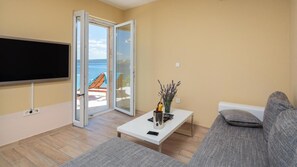 Apartamento, 2 quartos, sacada | Sala de estar