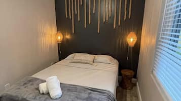 2 dormitorios, tabla de planchar con plancha, wifi y ropa de cama