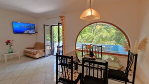 Ferienhaus, 3 Schlafzimmer, Balkon, Gartenblick | Speisen