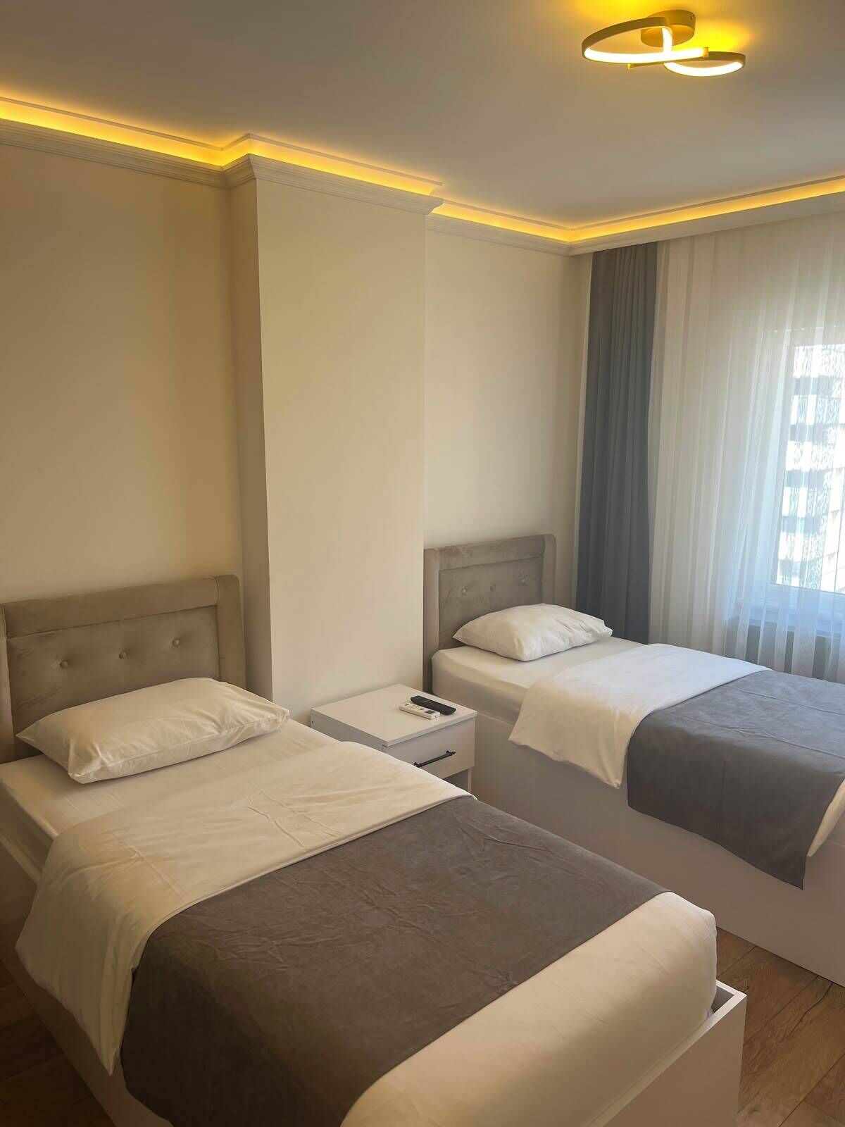 Deluxe Twin Room, 2 Twin Beds | Soundproofing, WiFi (free), bed sheets