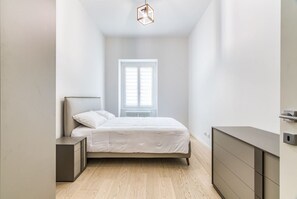 2 dormitorios, tabla de planchar con plancha, wifi y ropa de cama