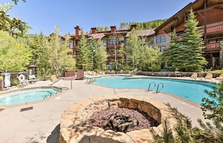 Outdoor pool, a heated pool. Beautiful first floor STUDIO apartment including hot tub + pool