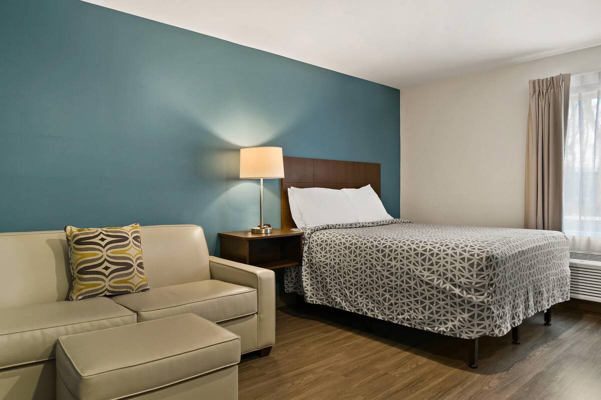 Desk, laptop workspace, blackout curtains, free WiFi