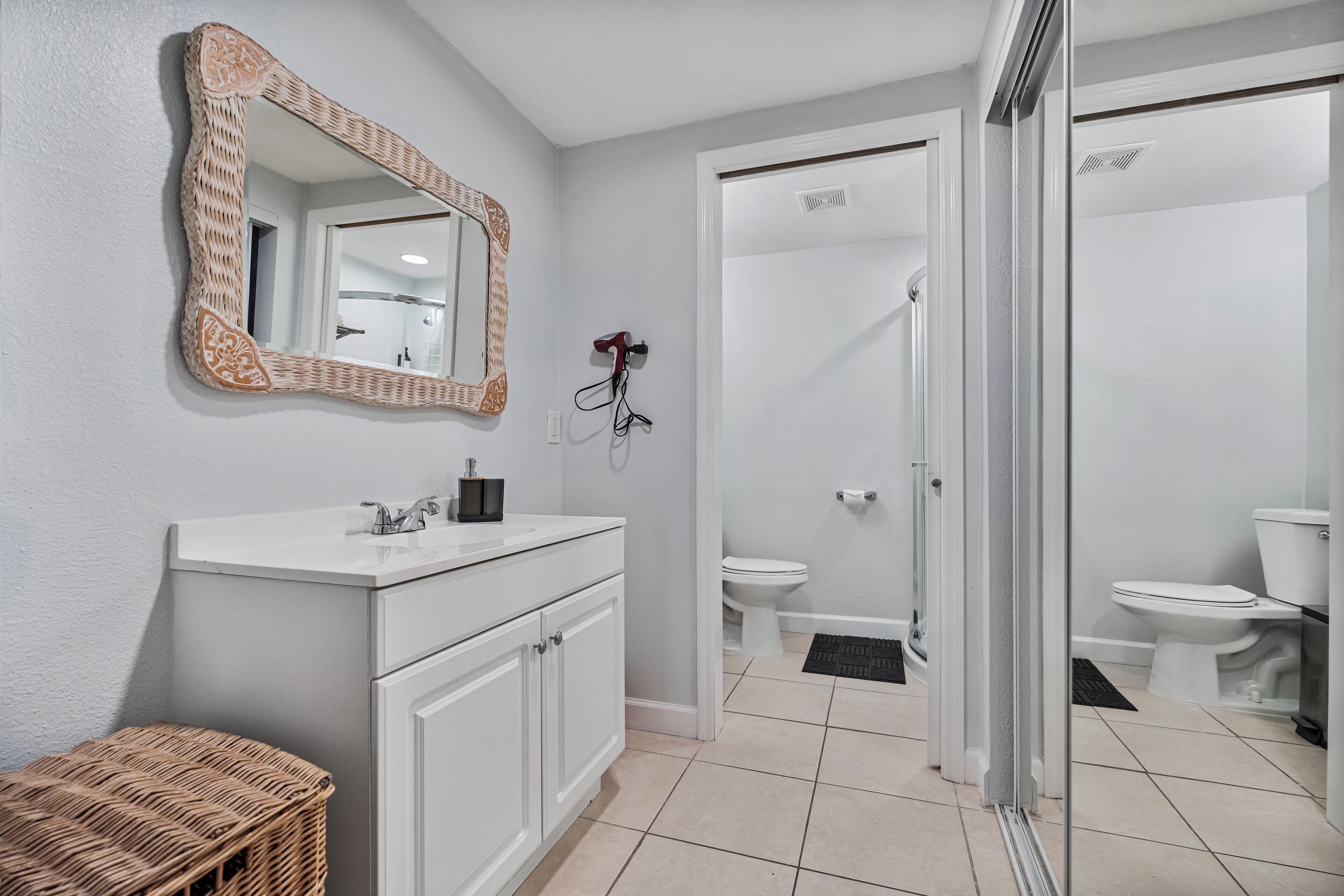 Shower, hair dryer, towels, soap