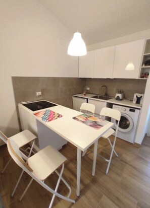 Apartment, 2 Bedrooms, Balcony, Garden View | Dining room - Pool Getaway in Bibione - Beahost (San Michele al Tagliamento)