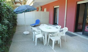 Apartment, 2 Bedrooms, Patio, Garden View | Terrace/patio - Coastal Flat With Shared Pool (Lignano Sabbiadoro)
