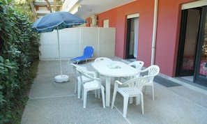 Apartment, 2 Bedrooms, Patio, Garden View | Terrace/patio - Coastal Flat With Shared Pool (Lignano Sabbiadoro)