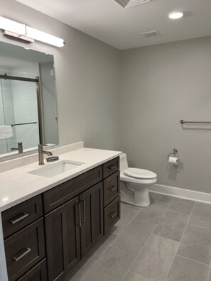 Shower, towels, soap, shampoo