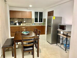 Fridge, microwave, stovetop, coffee/tea maker