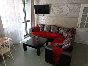 Appartement, 1 chambre, balcon, vue sur l’océan | Aire de séjour