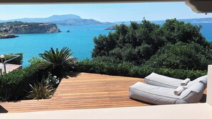 A wooden deck with a view of the sea and mountains. - Coco Seaview Apartment, 60sec Walk From Beach! (Apokoronas)