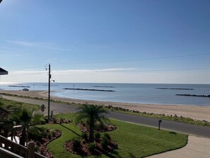 On the beach, sun-loungers, beach towels