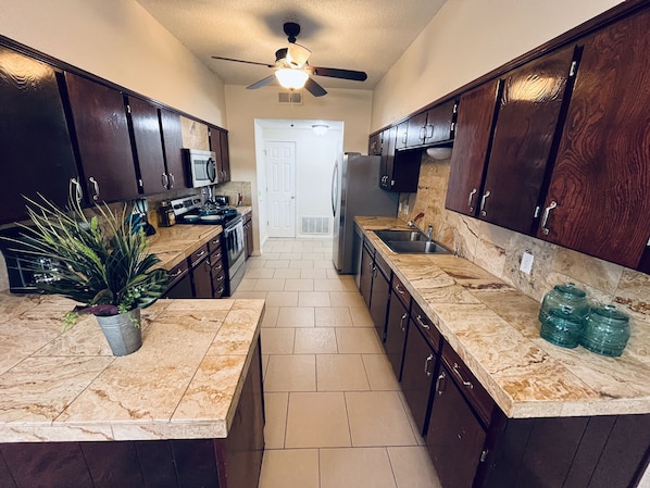 Fridge, microwave, oven, stovetop