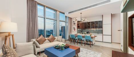 Qiu Ya One-Bedroom Elegant Suite | Living area | 55-inch LCD TV with satellite channels, toys