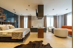 Premium bedding, memory foam beds, free minibar items, in-room safe