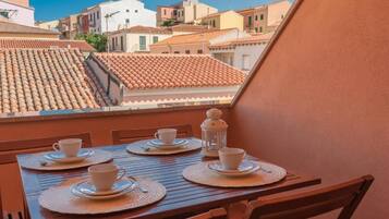 Apartment, Multiple Bedrooms, Balcony | Outdoor dining