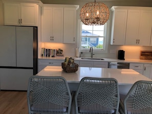 Private kitchen - Sun-kissed Mermaid / 846 Ocean Blvd West 2 Bedroom Home by RedAwning (Supply)