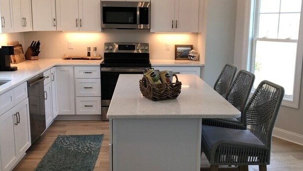 House, 2 Bedrooms | Private kitchen | Coffee/tea maker, fridge, oven, toaster - Sun-kissed Mermaid / 846 Ocean Blvd West 2 Bedroom Home by RedAwning (Supply)