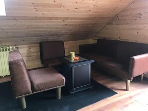 Apartment, 1 Schlafzimmer, Balkon, Gartenblick | Wohnbereich